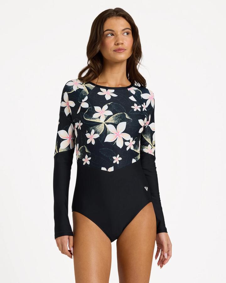 Image of a model wearing Tops. Product name - Roxy Womens Fashion Long Sleeve One Piece Swimsuit Anthracite Hibiscus Real S in Anthracite Hibiscus Real S colour by brand - Roxy
