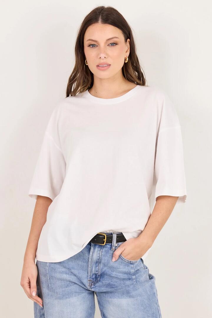 Image of a model wearing Tops. Product name - Boyfriend White Oversized Tee in White colour by brand - RE:UNION Label