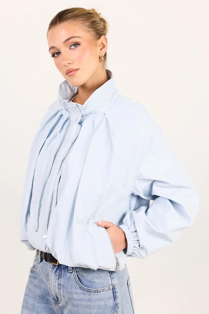 Image of Coats & Jackets. Product name - Element Ice Blue Drawstring Funnel Neck Bomber Jacket in Ice Blue colour by brand - Stories be Told