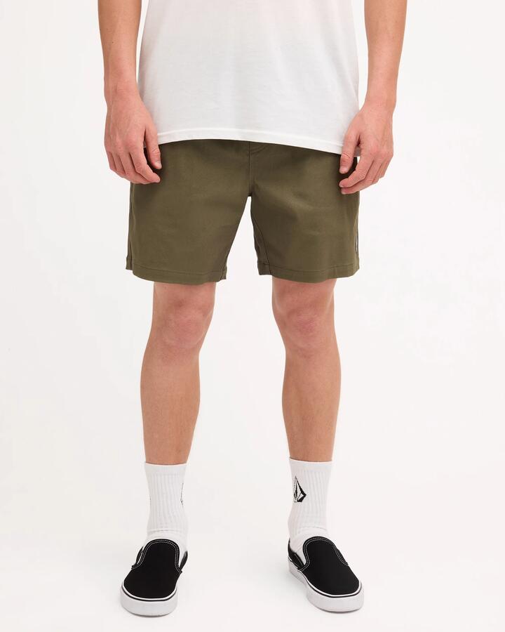 Image of a model wearing Shorts. Product name - Volcom Mens Lethal Stone Elastic Shorts Army Green Combo in Army Green Combo colour by brand - Volcom