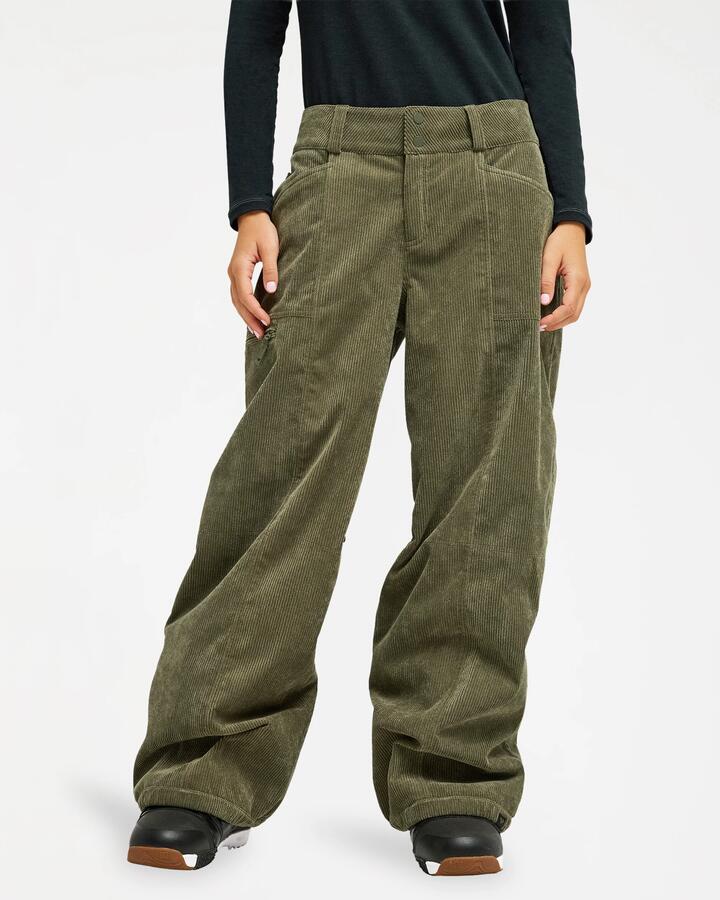 Image of a model wearing Pants. Product name - Roxy Womens 10K Airdrift Cord Snow Pants Beetle in Beetle colour by brand - Roxy