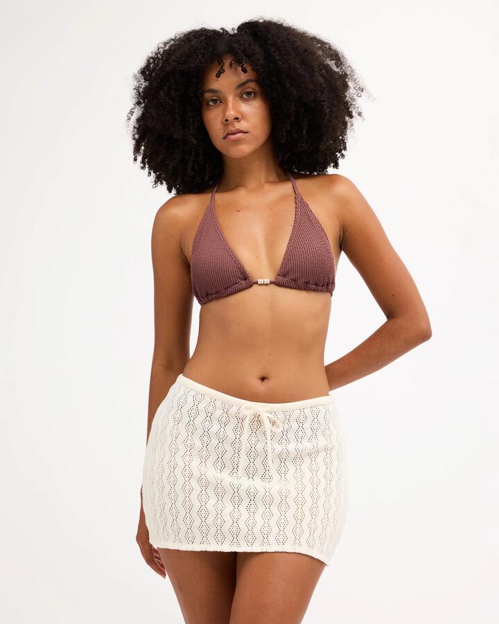 Image of a model wearing Skirts. Product name - Billabong Womens Sundew Mini Skirt Cover Up Sea Salt in Sea Salt colour by brand - Billabong