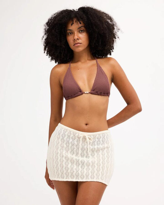 Image of a model wearing Skirts. Product name - Billabong Womens Sundew Mini Skirt Cover Up Sea Salt in Sea Salt colour by brand - Billabong