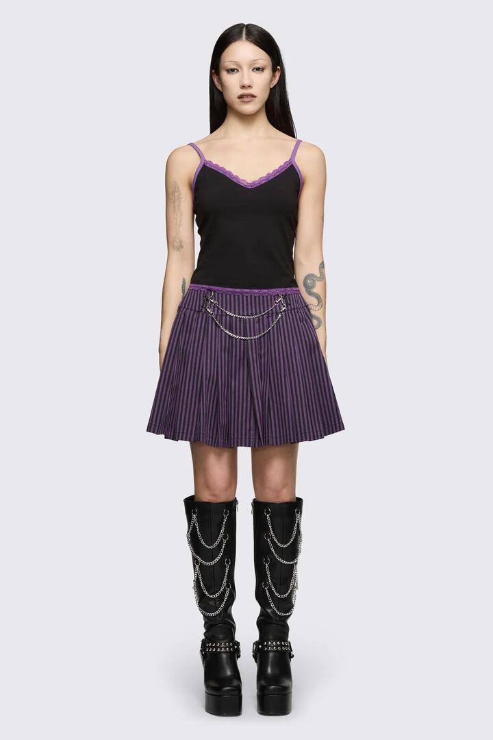Image of a model wearing Skirts. Product name - Spectre Pinstripe Skirt in Purple colour by brand - Dangerfield