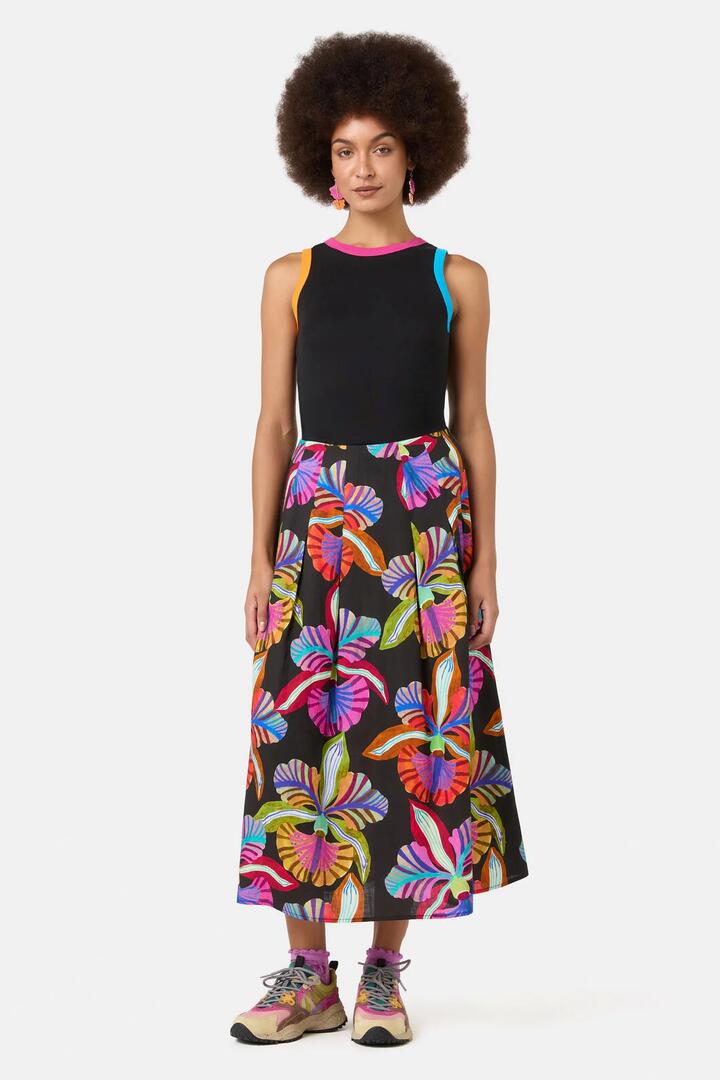Image of a model wearing Skirts. Product name - Orchid Printed Midi Skirt in Print colour by brand - Gorman