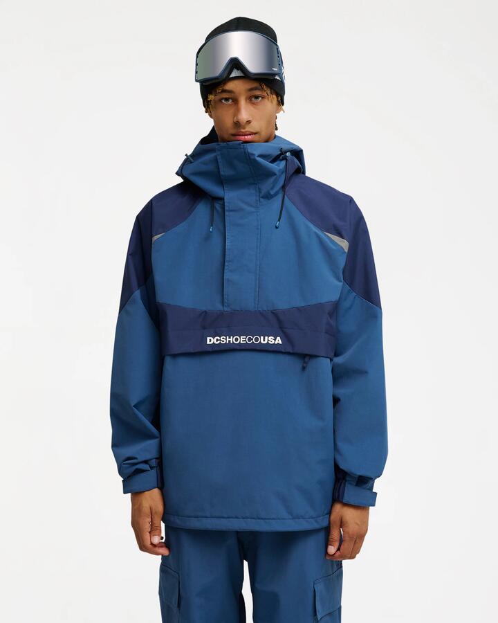 Image of a model wearing Outerwear. Product name - DC Shoes Mens Mt Lab Anorak 10K Snow Jacket Dark Denim in Dark Denim colour by brand - DC Shoes