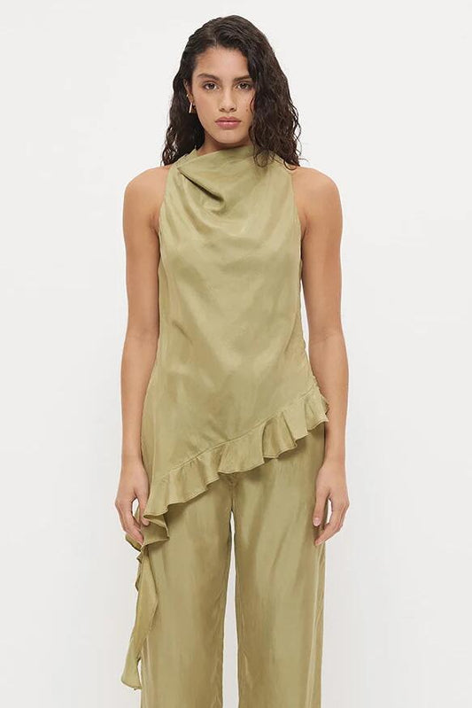 Image of a model wearing Tops. Product name - Eadie Olive Cowl Neck Asym Hem Ruffle Sleeveless Top in Green colour by brand - Mon Renn