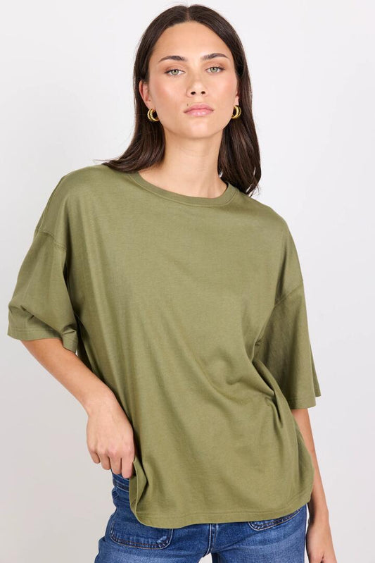 Image of a model wearing Tops. Product name - Boyfriend Washed Khaki Oversized Tee in Washed Khaki colour by brand - RE:UNION Label