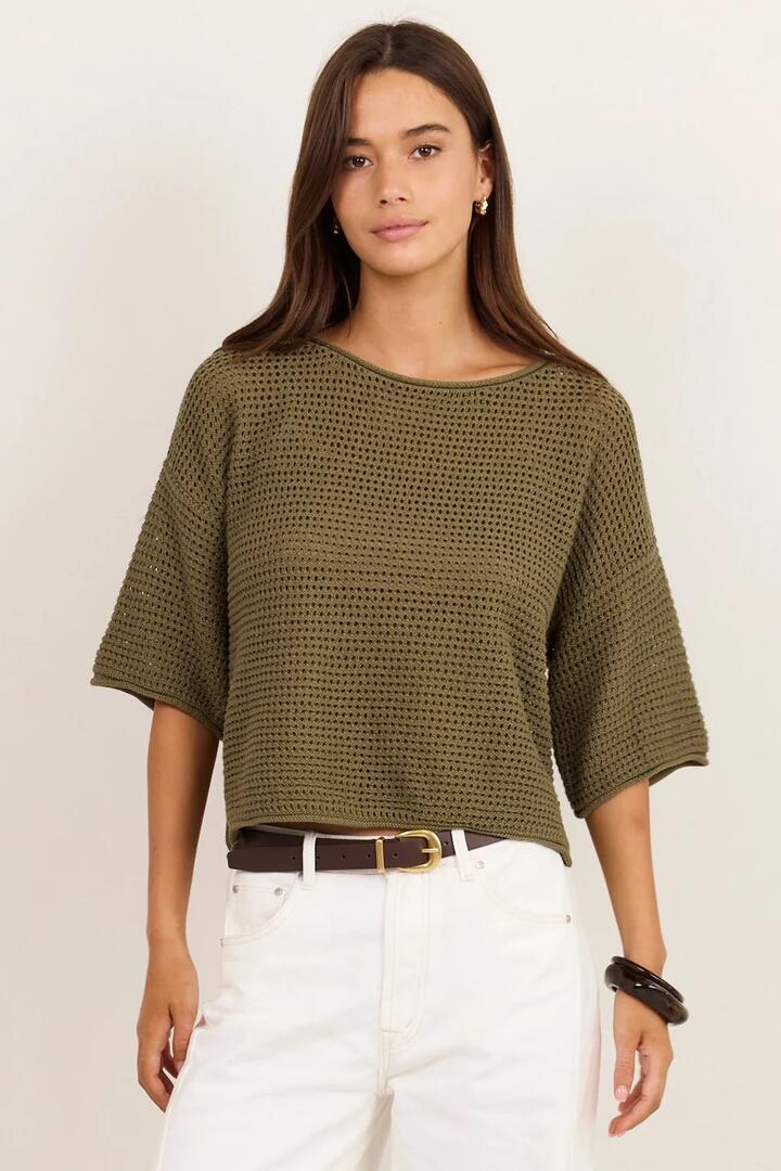 Image of a model wearing Outerwear. Product name - Sunrise Light Khaki SS Crochet Knit Top in Light Khaki colour by brand - RE:UNION Label