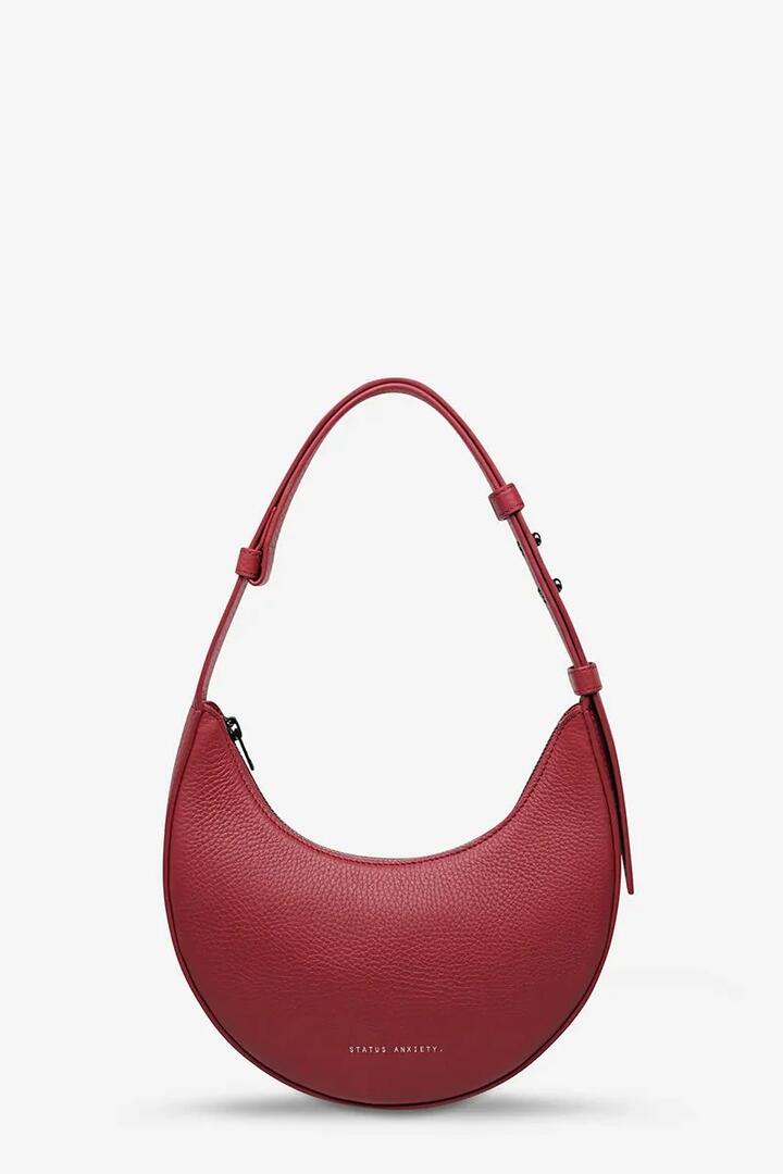 Image of Bags. Product name - Kind of Magic Rouge Crescent Shoulder Bag in Red colour by brand - Status Anxiety