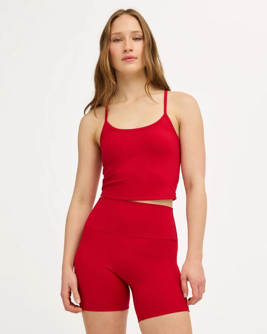 Image of a model wearing Tops. Product name - Surf Dive 'n Ski Womens Rvca Longline Tank Top Scarlet in Scarlet colour by brand - Surf Dive 'n Ski