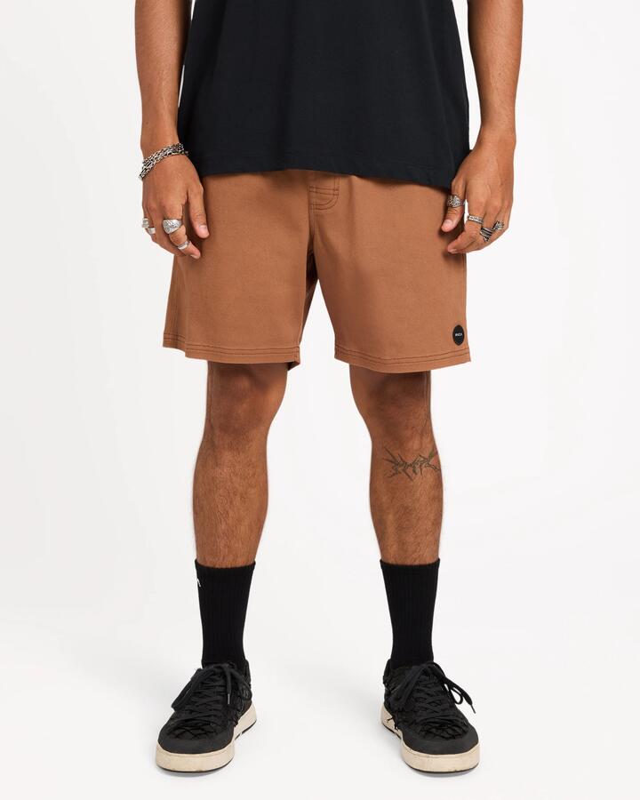 Image of a model wearing Shorts. Product name - Surf Dive 'n Ski Mens Escape Shorts Rawhide in Rawhide colour by brand - Surf Dive 'n Ski