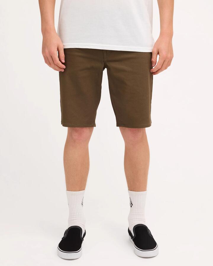 Image of a model wearing Shorts. Product name - Volcom Mens Mfo V Solver Twill Shorts Wintermoss in Wintermoss colour by brand - Volcom