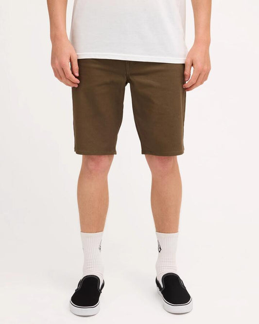Image of a model wearing Shorts. Product name - Volcom Mens Mfo V Solver Twill Shorts Wintermoss in Wintermoss colour by brand - Volcom