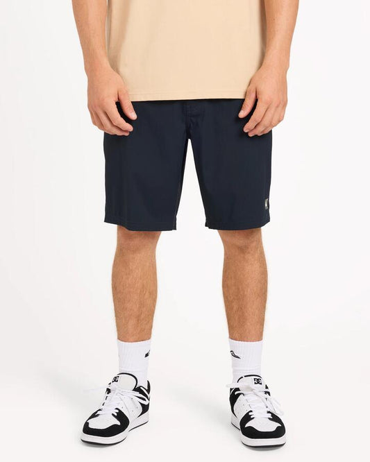 Image of a model wearing Shorts. Product name - Surf Dive 'n Ski Mens Overcast Amphibian 20" Hybrid Shorts Black in Black colour by brand - Surf Dive 'n Ski