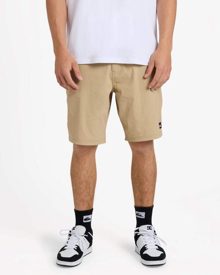Image of a model wearing Shorts. Product name - Surf Dive 'n Ski Mens Overcast Amphibian 20" Hybrid Shorts Pine Bark in Pine Bark colour by brand - Surf Dive 'n Ski