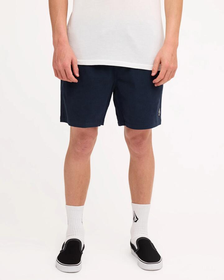 Image of a model wearing Shorts. Product name - Volcom Mens Mfo Lethal Stone Shorts Navy in Navy colour by brand - Volcom
