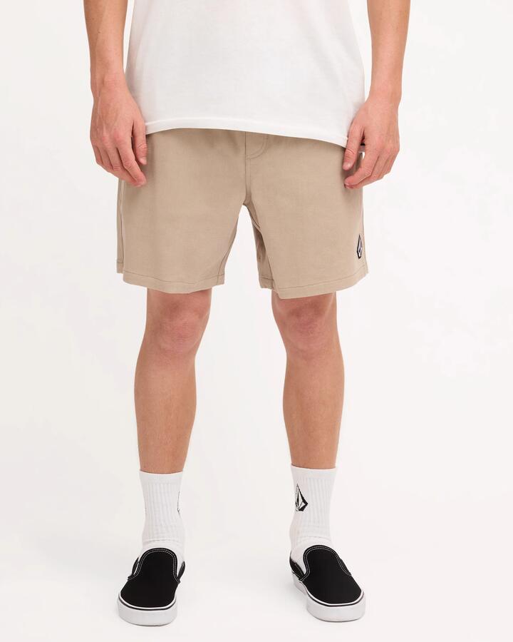 Image of a model wearing Shorts. Product name - Volcom Mens Mfo Lethal Stone Shorts Light Khaki in Light Khaki colour by brand - Volcom