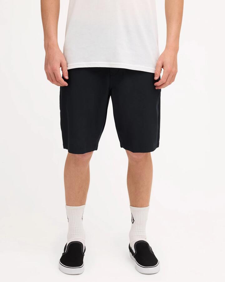 Image of a model wearing Shorts. Product name - Volcom Mens Mfo Kerosene Hybrid Shorts Black in Black colour by brand - Volcom