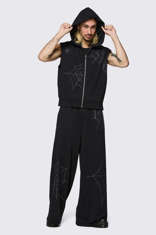 Image of a model wearing Outerwear. Product name - Webbed Diamante Zip Up in Black colour by brand - Black Friday
