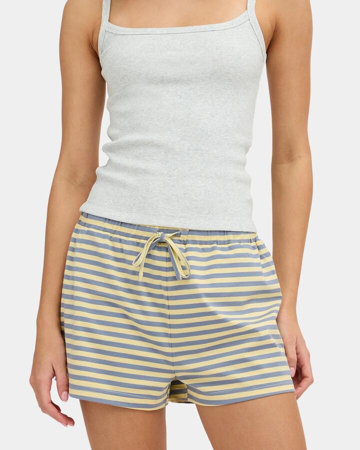 Image of a model wearing Shorts. Product name - Nunui Womens Frankie Elastic Waist Shorts Butter in Butter colour by brand - Nunui