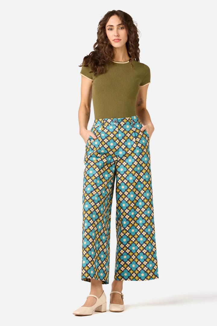 Image of a model wearing Pants. Product name - Mimi Retro Wide Leg Pant in Navy colour by brand - Princess Highway