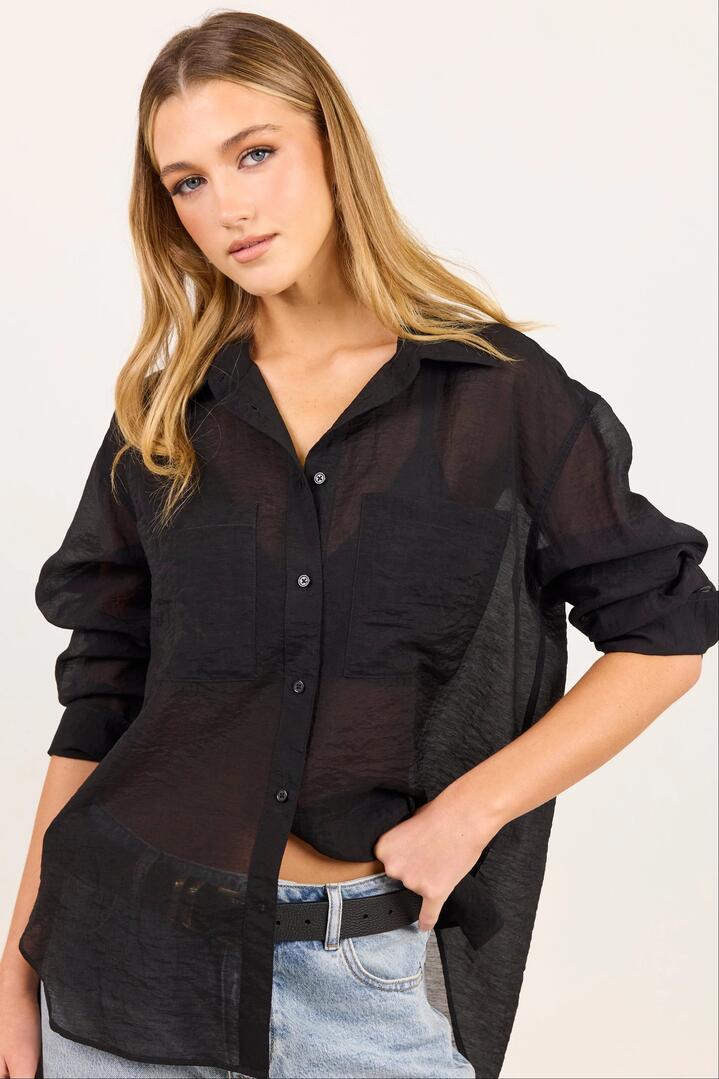 Image of Shirts. Product name - Reflex Black Semi Sheer Oversized Boyfriend Shirt in Black colour by brand - Stories be Told