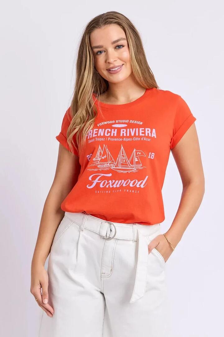 Image of a model wearing Tops. Product name - Sailing Grenadine Club Print SS Tee in Red colour by brand - Foxwood