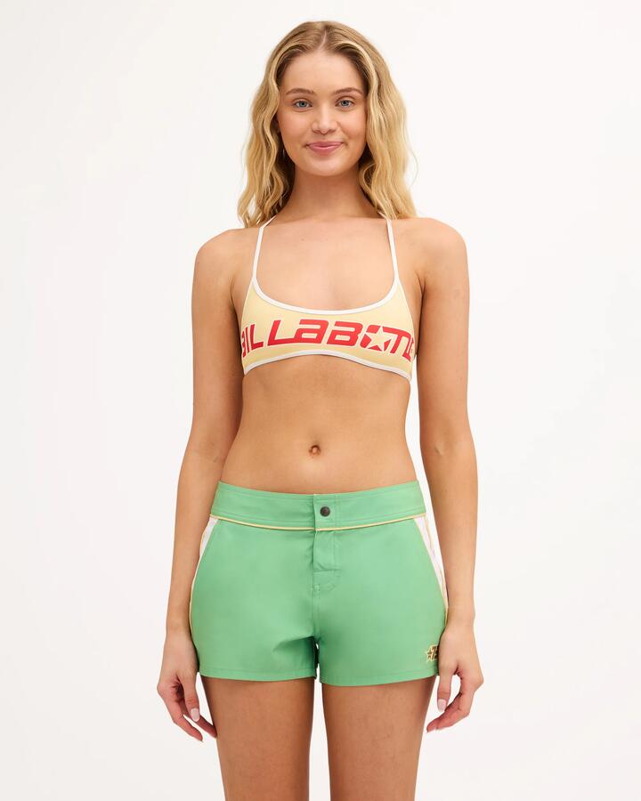 Image of a model wearing Pants. Product name - Surf Dive 'n Ski Womens Sunset Nomad Pants Multi in Multi colour by brand - Surf Dive 'n Ski
