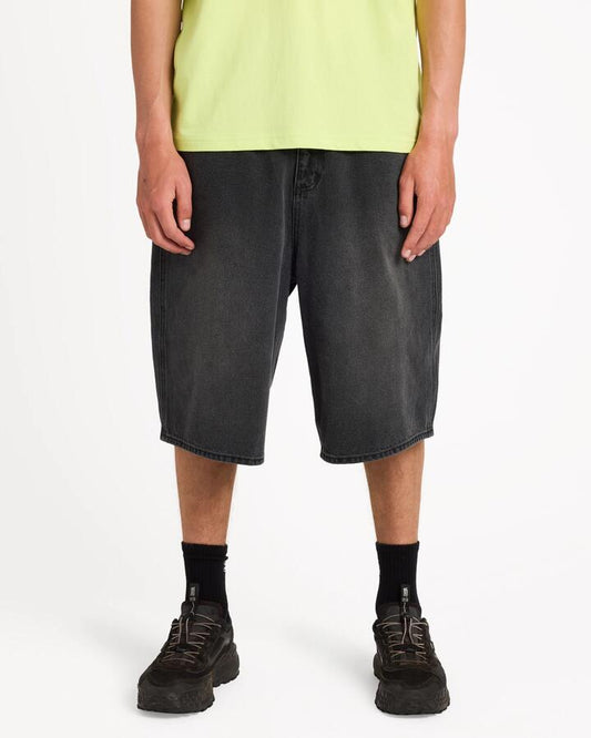 Image of a model wearing Shorts. Product name - Surf Dive 'n Ski Mens Spec 73 Denim Shorts Black in Black colour by brand - Surf Dive 'n Ski