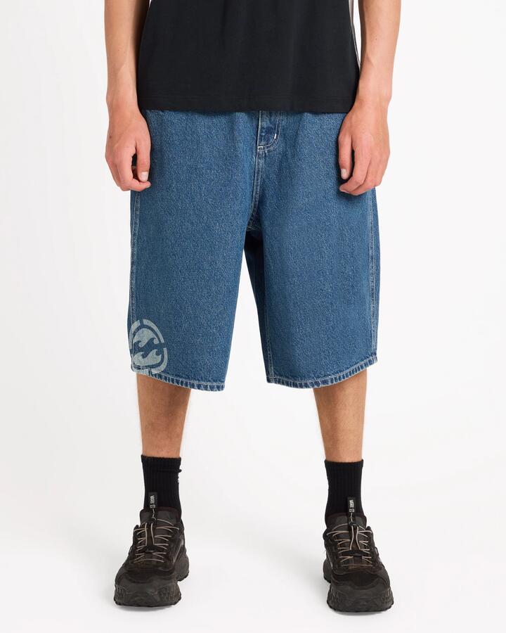 Image of a model wearing Shorts. Product name - Surf Dive 'n Ski Mens Spec 73 Baggy Denim Shorts Ocean Wash in Ocean Wash colour by brand - Surf Dive 'n Ski