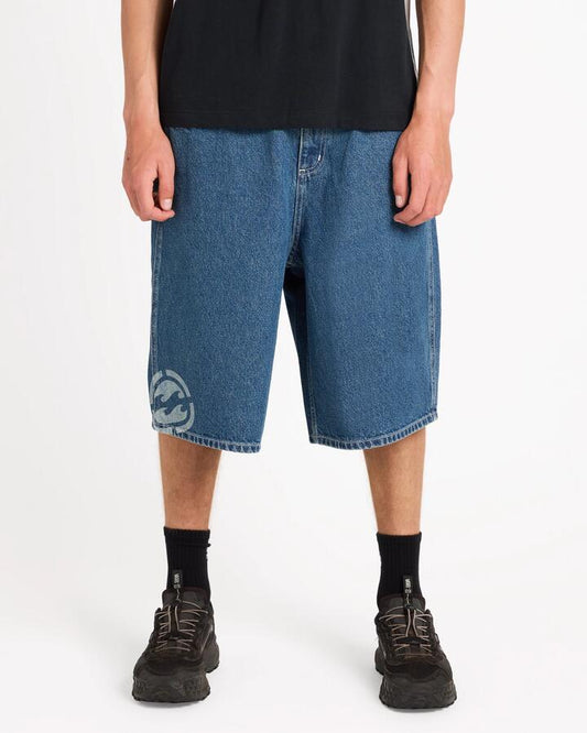 Image of a model wearing Shorts. Product name - Billabong Mens Spec 73 Baggy Denim 23" Shorts Ocean Wash in Ocean Wash colour by brand - Billabong