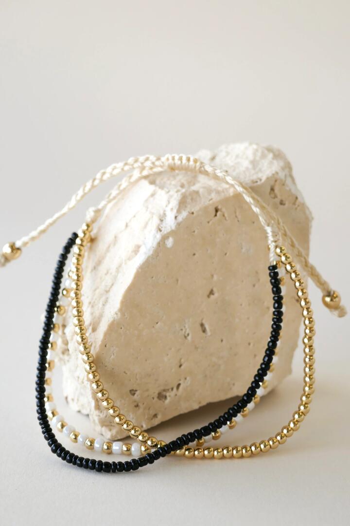 Image of Jewelry. Product name - Triple Bead EOL Gold Black White Bracelet in Black colour by brand - Humble + Heart