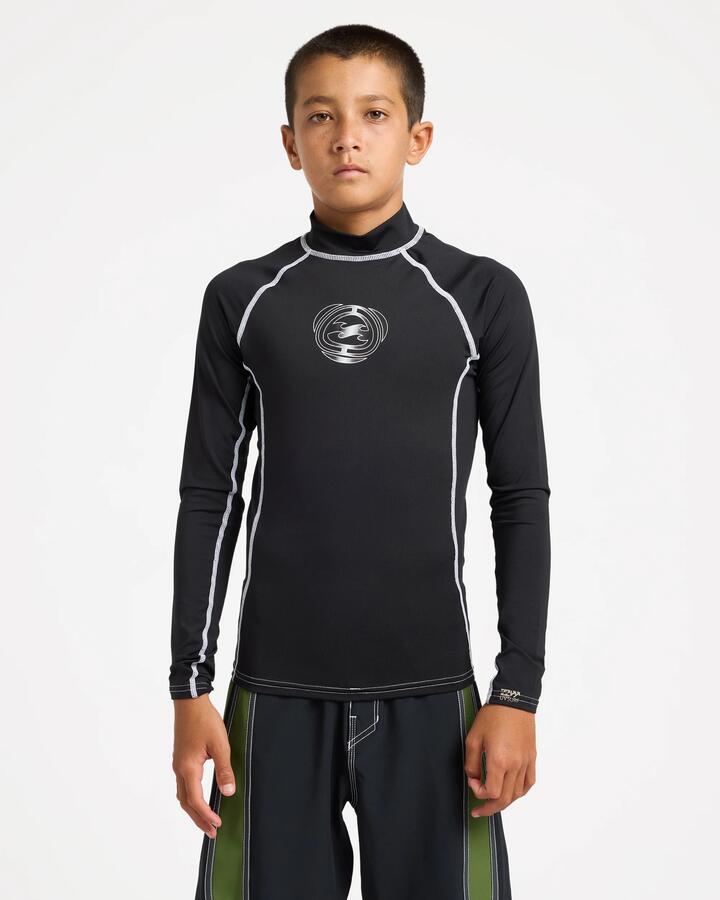 Image of a model wearing Tops. Product name - Billabong Boys 8-16 Boys Spec 73 Upf 50 Long Sleeve Rashguard Black in Black colour by brand - Billabong