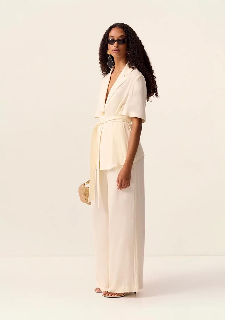 Image of a model wearing Pants. Productname: Posey Pants in Ivory colour by brand - MOS The Label