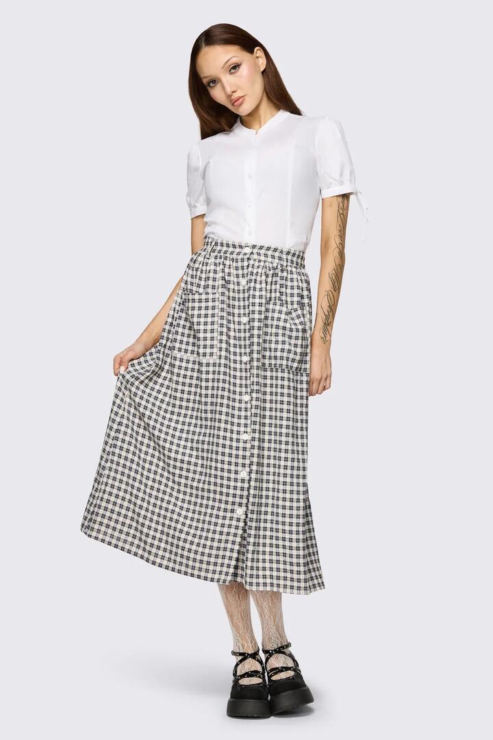 Image of a model wearing Skirts. Product name - Darling Gingham Midi Skirt in Black/White colour by brand - Dangerfield