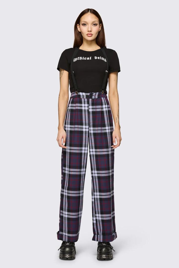 Image of a model wearing Pants. Product name - Monstre Tartan Pant in Purple colour by brand - Black Friday