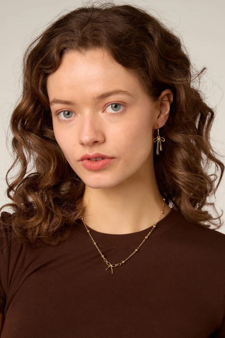 Image of Earrings. Product name - Gold Bow Sleeper Earrings in Gold colour by brand - Princess Highway