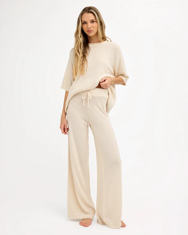 Image of a model wearing Pants. Product name - Roxy Shadows Pant Pebble in Pebble colour by brand - Roxy
