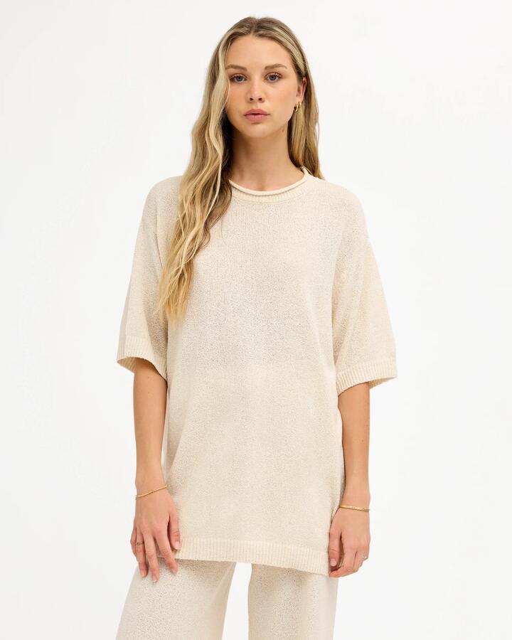 Image of a model wearing Tops. Product name - Roxy Shadows Top Pebble in Pebble colour by brand - Roxy