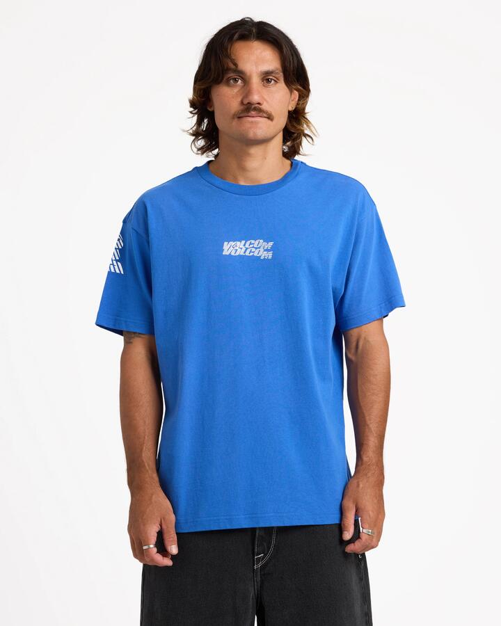 Image of a model wearing Tops. Product name - Volcom Mens Reaper Long Sleeve T-Shirt Regatta Blue in Regatta Blue colour by brand - Volcom