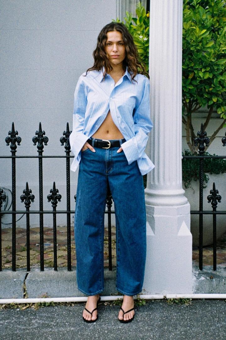 Image of Jeans. Product name - Gigi Forever Blue Mid Barrel Jean in Blue colour by brand - Rollas