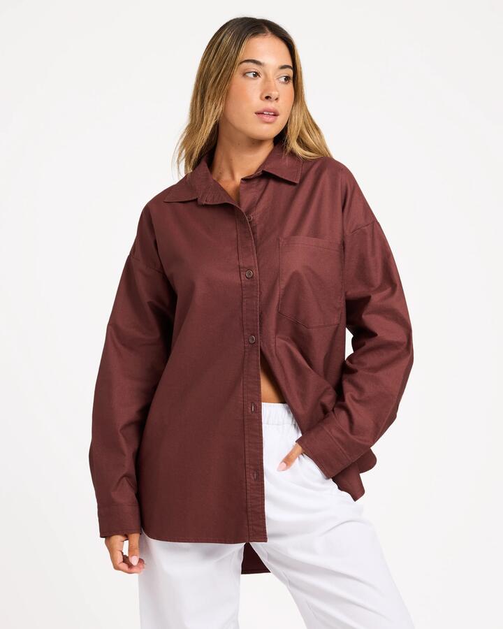 Image of a model wearing Tops. Product name - Roxy Womens Alltime Long Sleeve Shirt Java in Java colour by brand - Roxy
