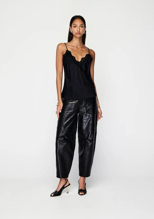 Image of a model wearing Tops. Productname: Suri Cami Top | MOS The Label in Black colour by brand - MOS The Label