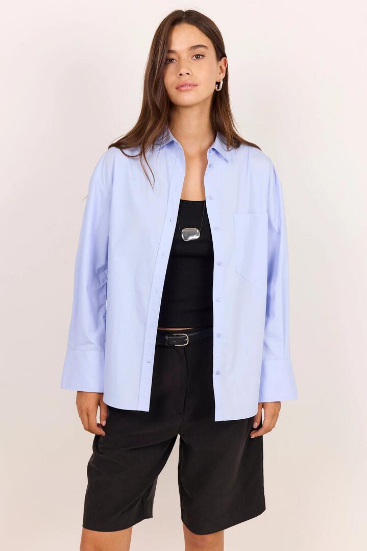Image of Shirts. Product name - Idealist Ice Blue Oversized Long Sleeve Shirt in Ice Blue colour by brand - RE:UNION Label