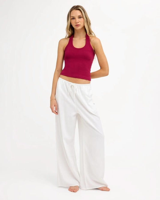 Image of a model wearing Pants. Product name - Roxy Womens Lolani Elastic Waist Pants White in White colour by brand - Roxy