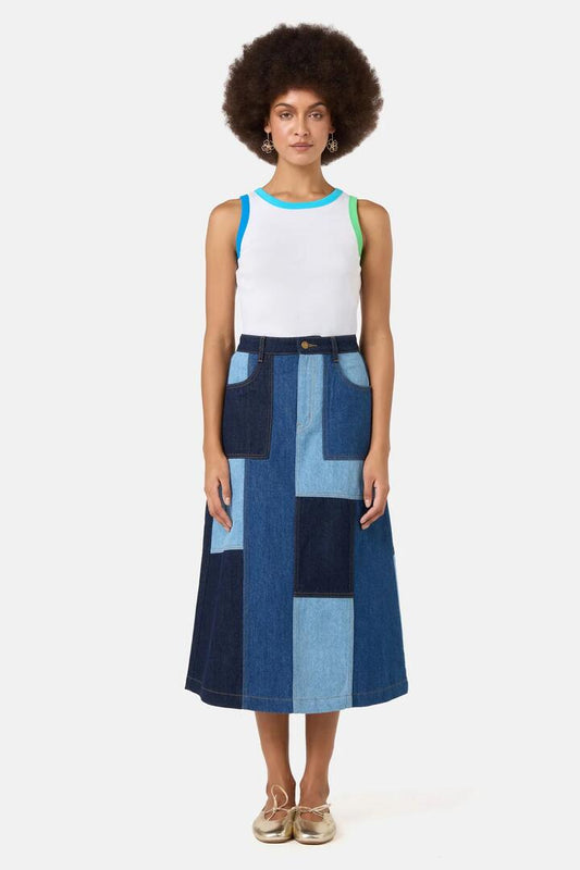 Image of a model wearing Skirts. Product name - Puzzle Denim Skirt in Denim colour by brand - Gorman