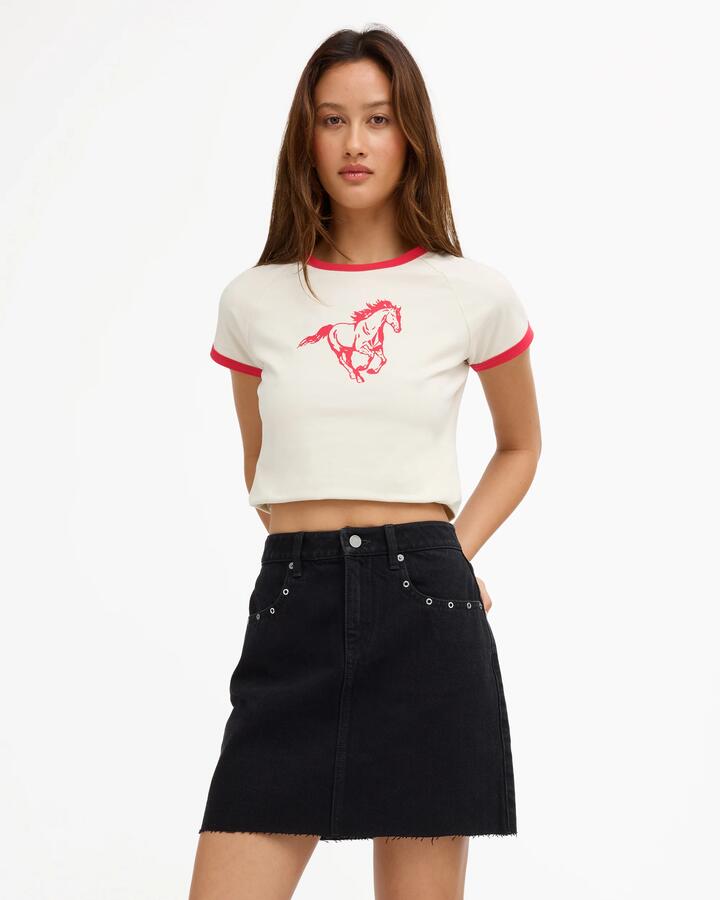 Image of a model wearing Skirts. Product name - Volcom Womens Stoneray Mini Skirt Black in Black colour by brand - Volcom