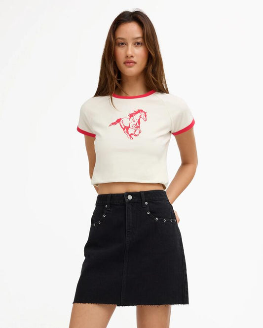 Image of a model wearing Skirts. Product name - Volcom Womens Stoneray Mini Skirt Black in Black colour by brand - Volcom