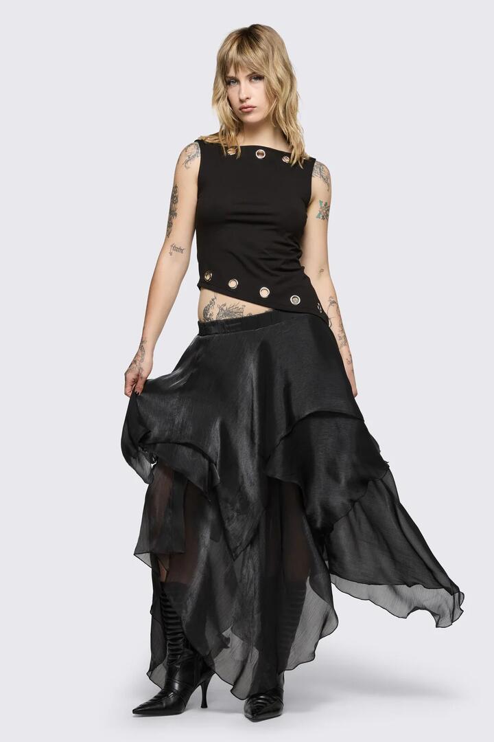 Image of a model wearing Skirts. Product name - Behind The Blinds Chiffon Skirt in Black colour by brand - Black Friday